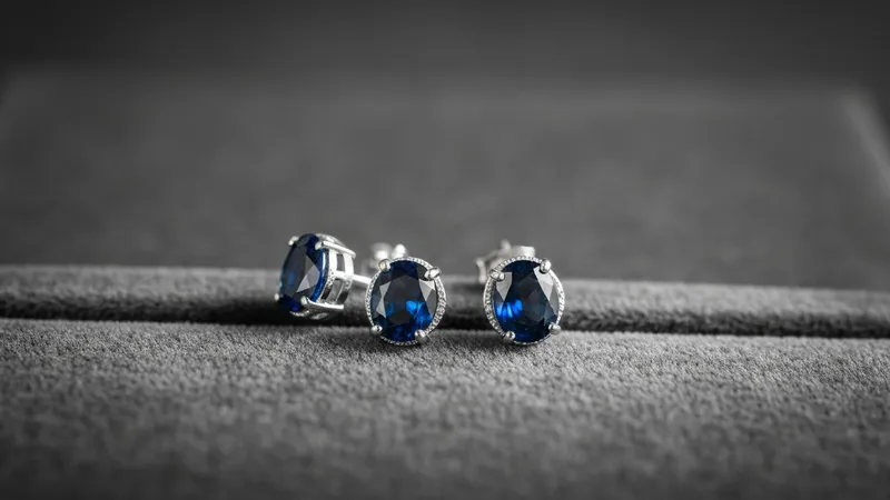 Boucles d'oreilles saphir entourage diamants